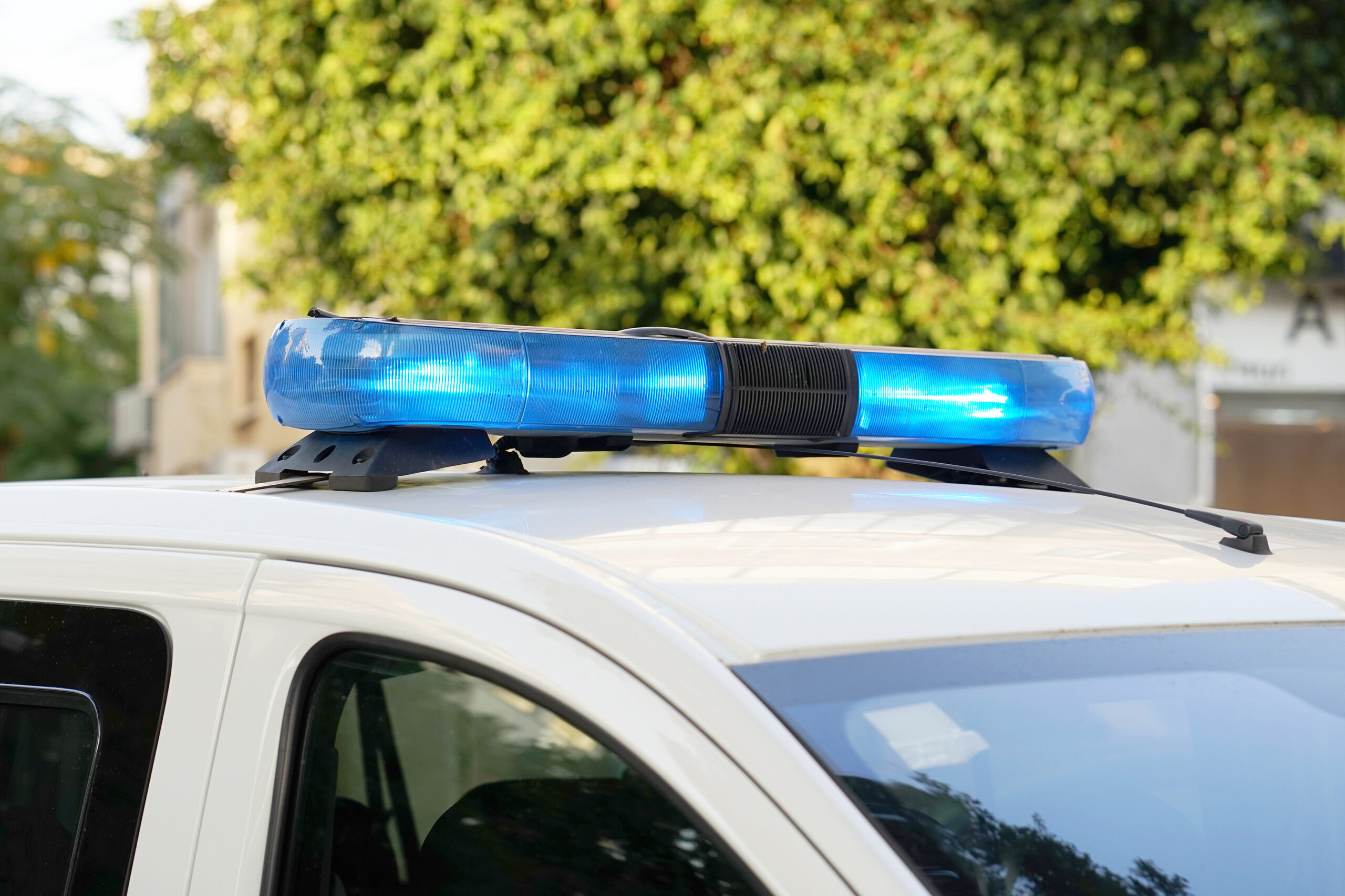 Close-up of the blue lights on top of a police vehicle