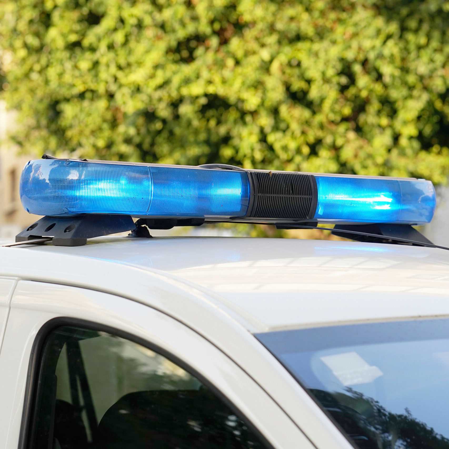 Close-up of the blue lights on top of a police vehicle